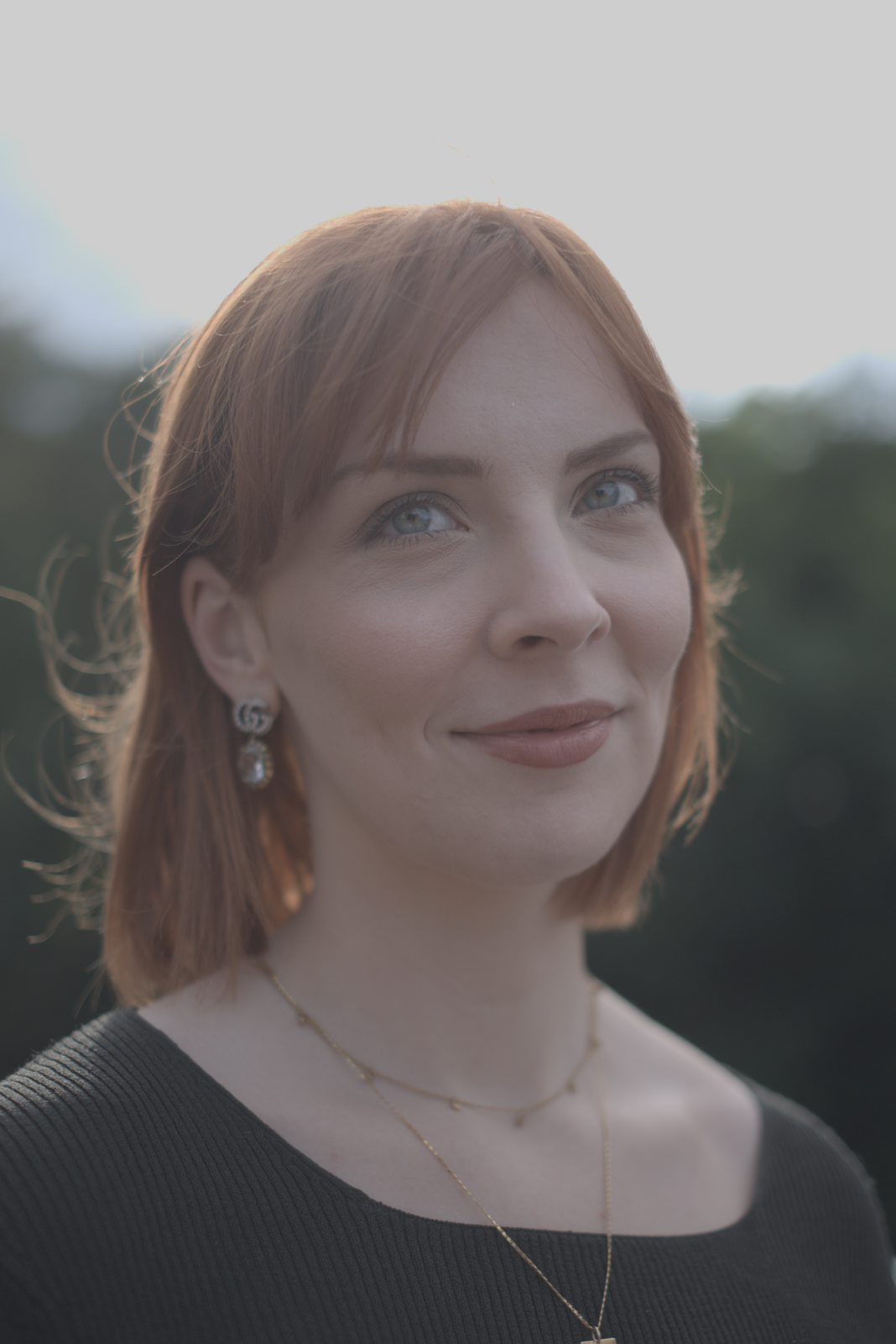 The portrait with no colour correction matrix applied. Skin tones look slightly muted; reds in the hair are flatter than they should be.